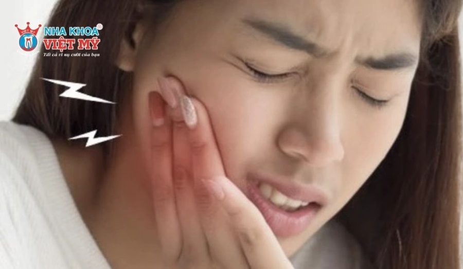 Cảm giác hơi cộm sau khi lấy tủy răng